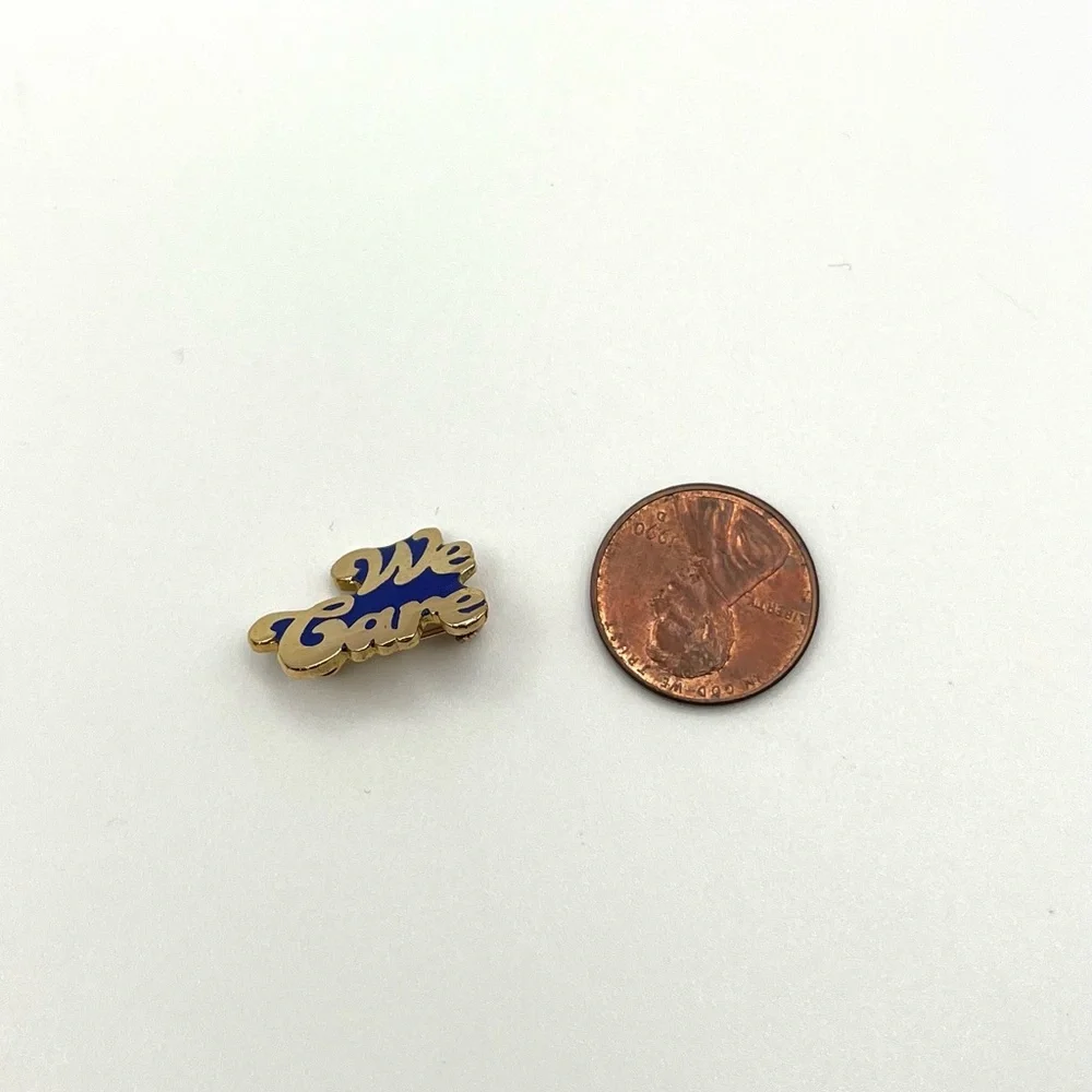 Vintage “We Care” Enamel Pin Gold Tone Blue Script Employee Volunteer Retro - Picture 3 of 3